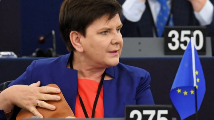 Premier-B-Szydlo-UE