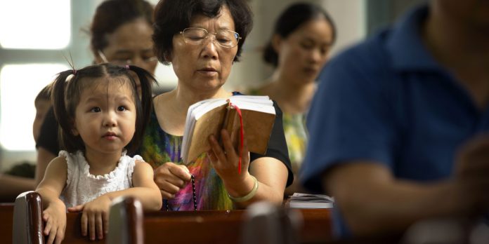 web3-china-catholics-girl-zhejiang-ap-photo_mark-schiefelbein
